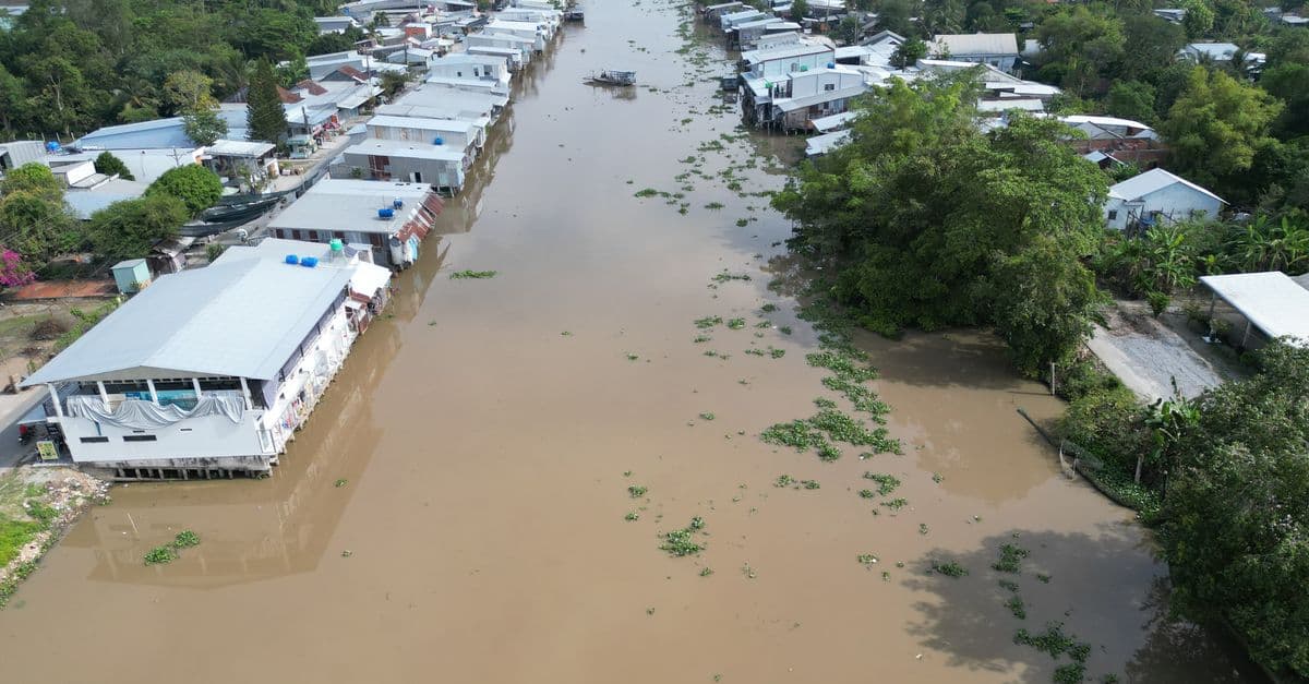 Aerial view of a flooded riverside settlement